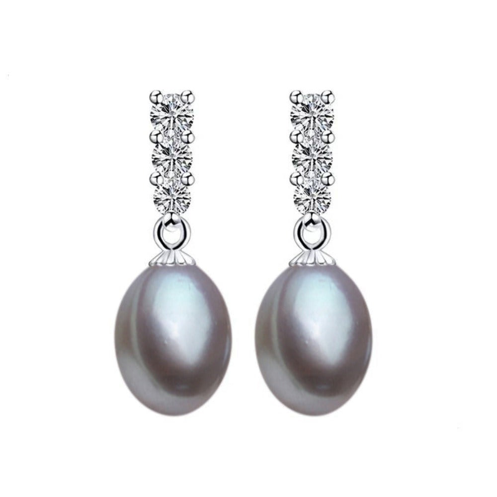 Pendientes colgantes auténticos de pera de agua dulce y diamantes de imitación