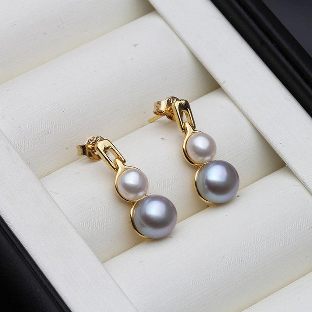 Pendientes colgantes dobles de perlas genuinas de agua dulce en oro