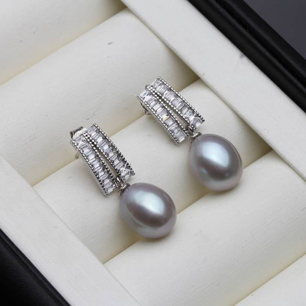 Pendientes colgantes de diseño con perlas de agua dulce auténticas y diamantes de imitación