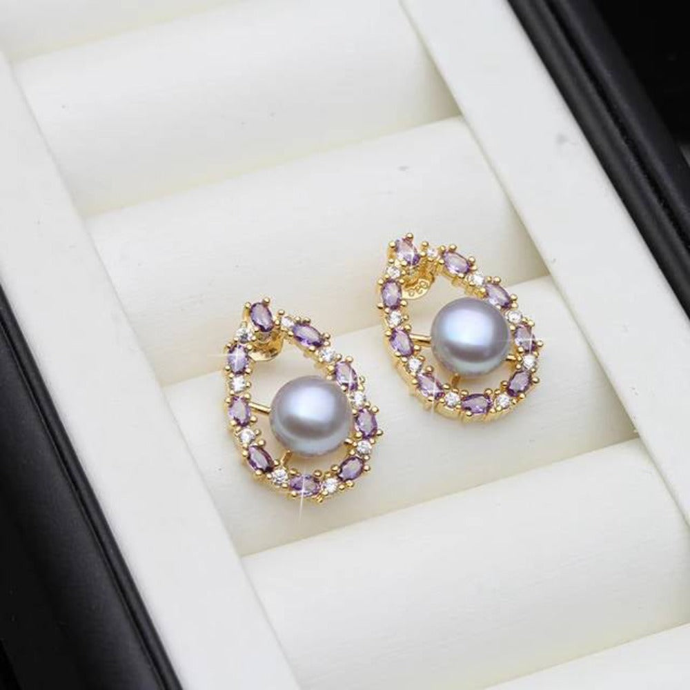Pendientes ovalados de perlas de agua dulce auténticas y diamantes de imitación morados de diseñador