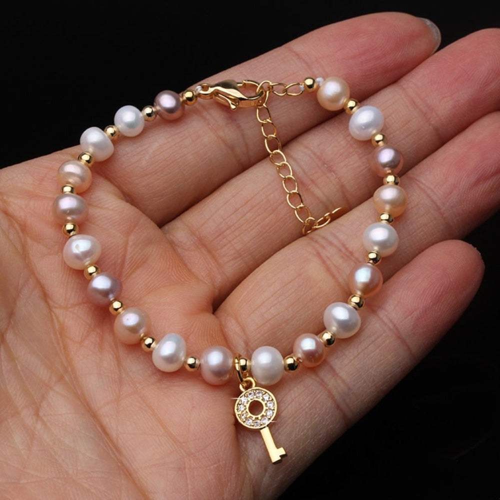 Genuine Pink, Purple & White Freshwater Pearl Key Bracelet in Gold