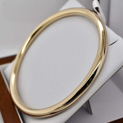 Klassischer massiver Golf-Armreif, schweres Gelbgold, 66 mm